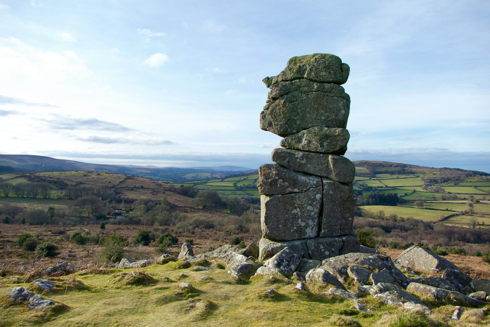 A granite tor on Dartmoor, Devon, overlooking the countryside